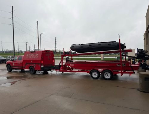 Passerby rescues person from Blue River; crews search for possible second person